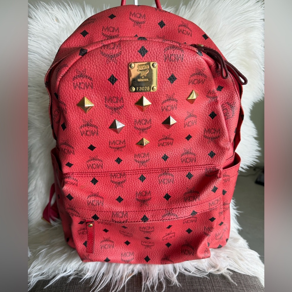 MCM Red Logo Studded Backpack with Gold Accents